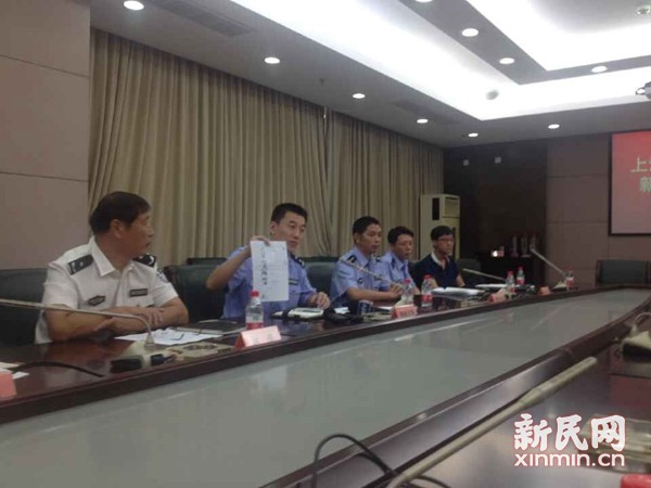 　　警方展示8月底就掌握的團伙成員信息。新民晚報記者沈文林攝