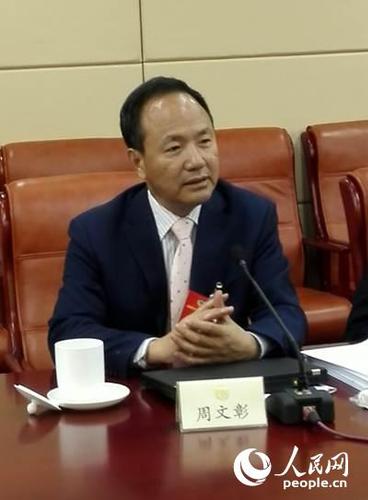 全國政協(xié)委員、國家行政學院原副院長周文彰