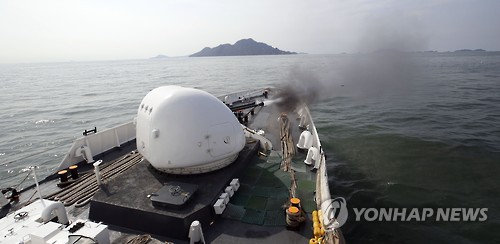 資料圖：韓海警對中國漁船執法首次使用機槍射擊。