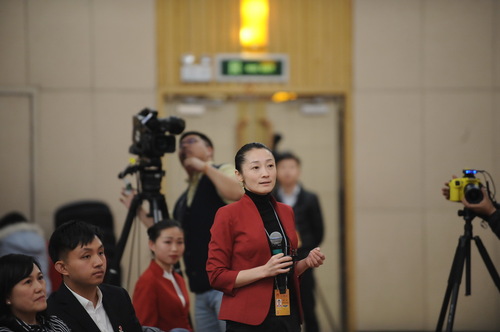 中國教育電視臺記者提問。