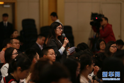 圖為北京青年報記者提問。