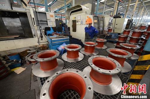 資料圖：正在工作的工人。<a target='_blank' href='http://www.chinanews.com/'>中新社</a>記者 王東明 攝 