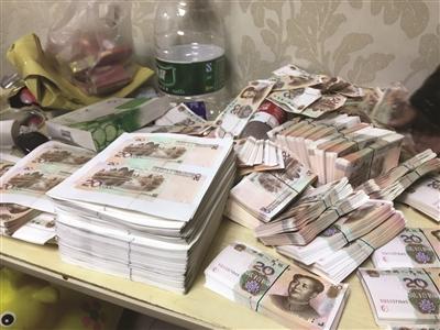  男子為發(fā)財買打印機造50萬假幣 讓快遞員幫郵寄