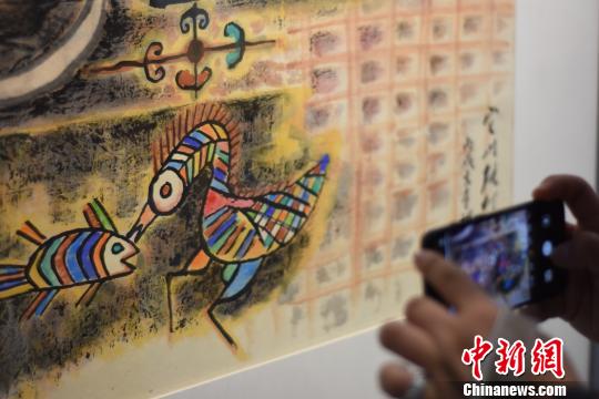 圖為張仃作品局部?！＄娊ㄉ?攝