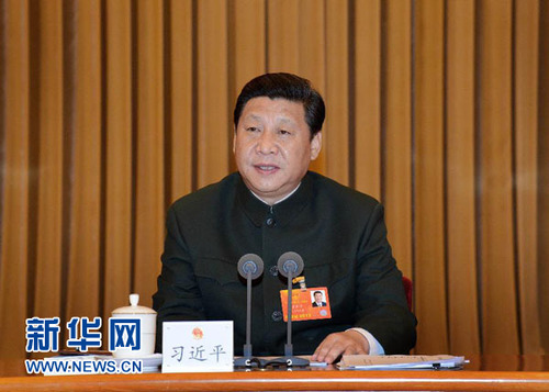 3月11日，中共中央總書記、中共中央軍委主席習近平出席十二屆全國人大一次會議解放軍代表團全體會議并發表重要講話。李剛 攝