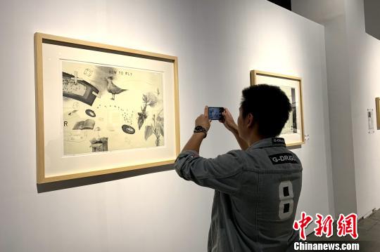 觀眾現場參展?！±钆迳?攝