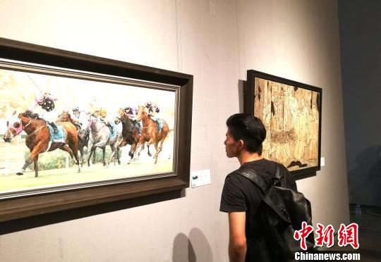 第十三屆全國美術作品展覽港澳臺·海外華人邀請作品展在廣州開幕 郭軍 攝