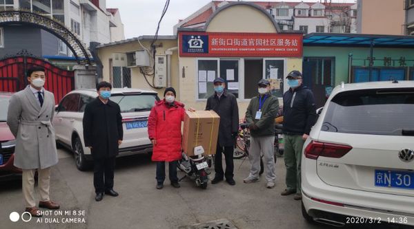 2民盟市委領導參與社區防控，盟員代表向社區贈送凈化器