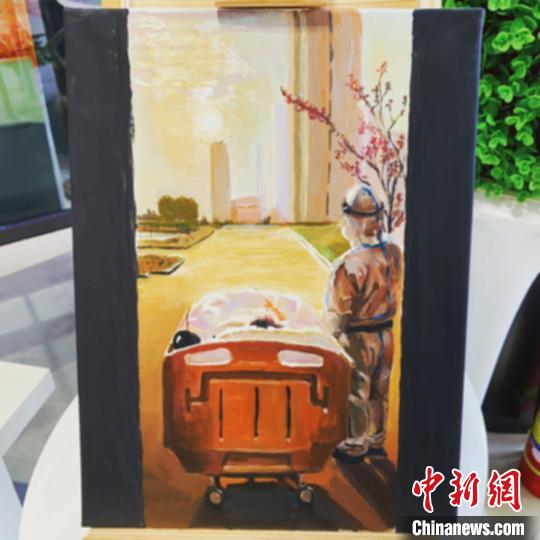 醫(yī)護(hù)人員陪同患者看夕陽(yáng)的照片被寧夏畫(huà)師創(chuàng)作成為油畫(huà)作品。　李佩珊 攝