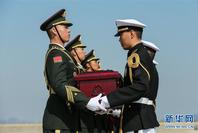 第六批在韓中國人民志愿軍烈士遺骸交接儀式在韓國舉行